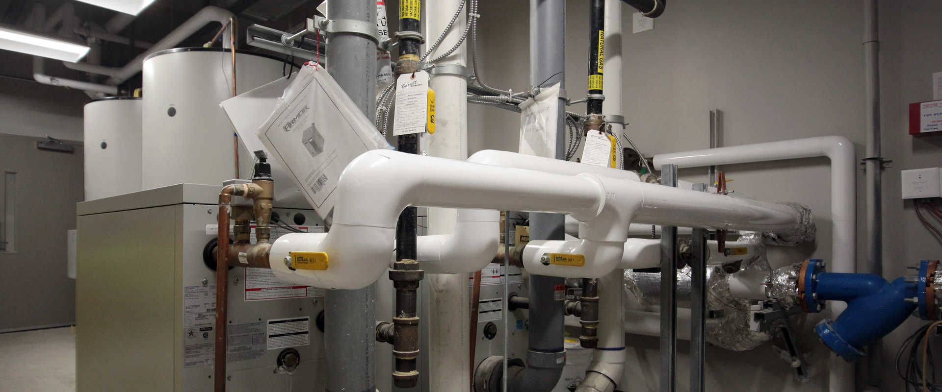 Boiler room / mechanical room heating processes, process piping project at a multi-unit residential facility or retirement home by Barrett Mechanical Inc. in London Ontario.